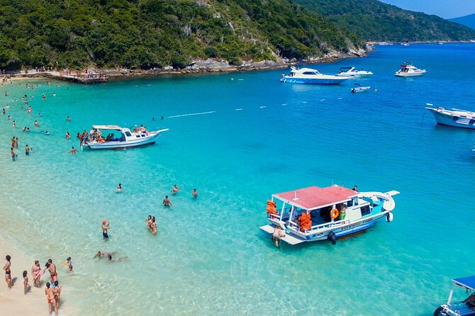 A Day in Arraial do Cabo Guided Tour - Prainhas do Pontal do Atalaia: steep stairs, tide drama, and changing water colors