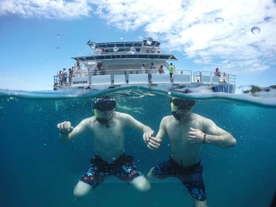 Búzios: Catamaran Boat Tour - The 11:30 departure, downtown pickup, and the possible Porto Veleiro boarding fee