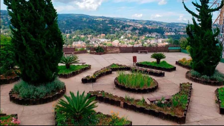Campos do Jordão: Private 8 Hour Tour - Ducha de Prata: artificial waterfalls, colorful umbrellas, and heart-shaped frames