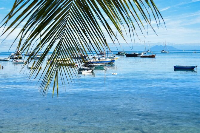 Day tour to Buzios - Azeda Beach and Azedinha: calm water, sheltered bay, and a colonial-style postcard view