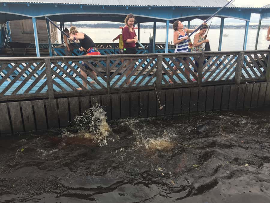 From Manuas: Full-Day River Tour - White-Sand Beach Break and Lunch on a Floating Restaurant