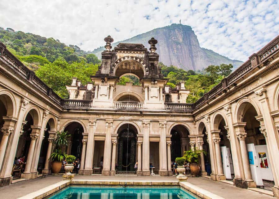 Green Rio: Guided Tour of Botanical Garden and Lage Park - The mansion courtyard, the pool, and a Christ the Redeemer sightline