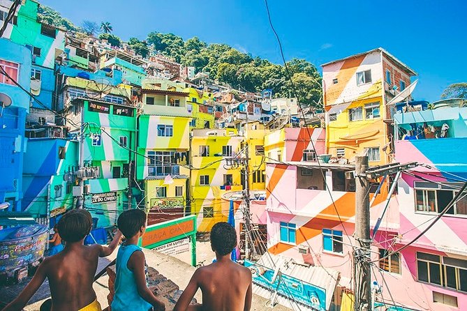 Guided Tour to the Favela DE Santa Marta - Stop at Dona Marta: resident-led alleys and the movie-location factor
