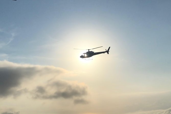 Helicopter Flight - Wonderful City - RJ (Private Flight - 4 people) - Copacabana Beach: The World-Famous Stretch You Can Read From Above