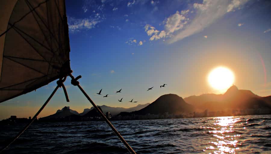 Rio de Janeiro: Guanabara Bay Sunset Sailing Tour & Drinks - Sugarloaf Mountain passing: the “arriving with light” moment