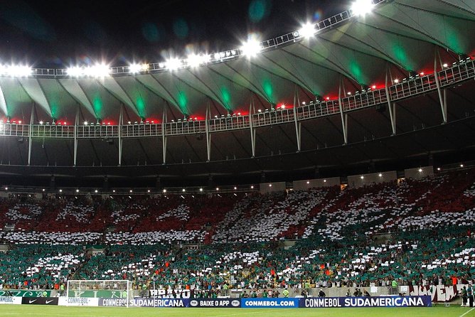 Soccer game in Rio de Janeiro with Local Supporter - Maracanã pre-match warm-up, with real crowd energy