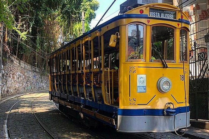Walking tour of the bohemian neighborhoods of Santa Teresa and Lapa - Arcos da Lapa: aqueduct arches, graffiti walls, and a city heartbeat